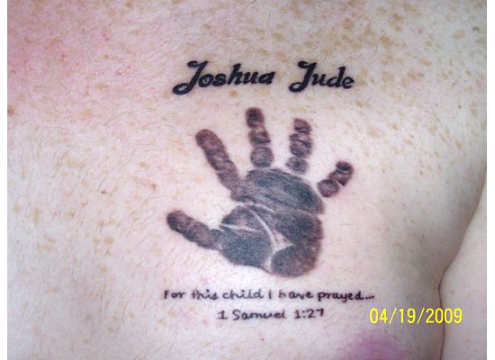 I have my son's left handprint at 3 months on my right chest with his name